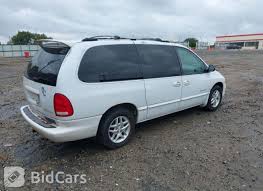 Image result for Bright Silver 2000 Caravan