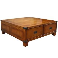 This table is made of undressed dark wooden planks. Square Campaign Coffee Table 4 Dwr Mahogany Akd Furniture