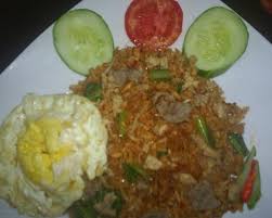 Ayam goreng literally means fried chicken in malay (including both indonesian and malaysian standards) and also in many indonesian regional languages (e.g. Nasi Goreng Jawa Teguh Raya