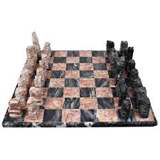 The italian game is one of the oldest recorded chess openings; Pink And Black Carved Italian Stone Marble Chess Set At 1stdibs