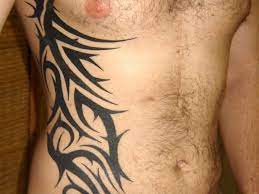 Like most of the tribal tattoo designs, polynesian tribal are done in solid black ink. Tatouage Tribal Homme Tatouage Tribal Tatouages De Croix Tribale