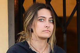 Paris Jackson Elevates Joggers in a Mesh Bodysuit & the Ideal White Booties
