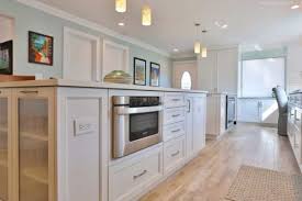 How tall can a kitchen island be above the countertop? Cabinets With Hidden Outlets Crafted By Kountry Kraft Cabinetry