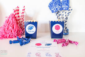 Cheerleader in pink & white with a big head bow with the football motif, cheer skirt, sneakers & pom poms. How To Throw An Amazing Football Baby Gender Reveal Party