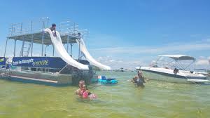 Large double decker pontoon boat with water slide! 5 Fun Family Activities In Destin