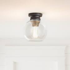 A rich oak finish and antique bronze combination. Home Decorators Collection Evelyn 1 Light Artisan Bronze Flush Mount With Clear Glass Hb1078 313 The Home Depot Flush Mount Lighting Flush Mount Lights Interior Light Fixtures