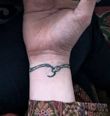 Tiny Ouroboros Tattoo On Wrist Orouboros Tattoo Ouroboros Tattoo Tattoos Snake Tattoo