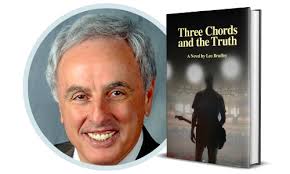 Leo Bradley discussing and signing Three Chords and the Truth