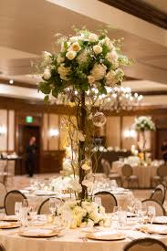 Give your florist an approximate guest count as soon as possible, even if you don't have the exact number finalized just yet. Tall Hydrangea And Garden Rose Centerpiece
