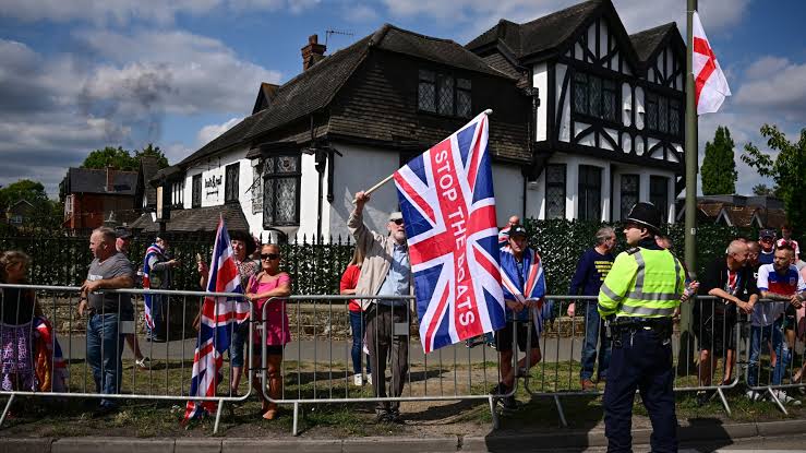 Scuffles, arrests as protesters across UK rally against asylum hotels
