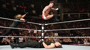 Cm Punk Def The Shield 3 On 1 Handicap Match Wwe Com Cm Punk Wwe World Wwe Raw Roman Reigns