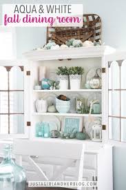 The hutch cabinet doors are plexiglass with an adjustable shelf inside so you can store larger, bulkier items. Aqua Fall Dining Room Abby Lawson