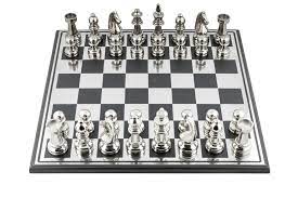 Beautiful veneer details and beautiful patina on the wood. Nickel Plated Chess Set Marina Home Interiors Marina Home Interiors