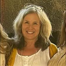 What is the meaning of "foreground" used as a verb in the sentence?