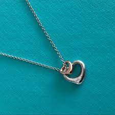 Tiffany Co Elsa Peretti Open Heart Pendant Extra Mini Size Less Than One Year Old In Good Conditi Heart Necklace Tiffany Open Heart Necklace Tiffany Co