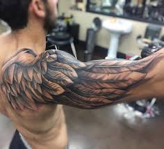 He Thought It Was Cool On Back Shoulder Blade To Top Of Shoulder Down The Arm To The Top Of Elbow Rig Best Sleeve Tattoos Cool Arm Tattoos Wing Tattoo Arm