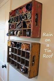 Make a scarf line using clothes pins and string to display your pretty collection. Coke Crate Tie Sock Belt And Scarf Storage 3 Life Sprinkled With Joy