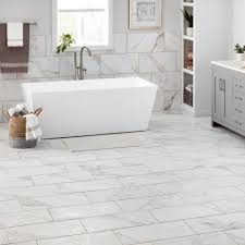 When we think of a shower stall, the classic tiles that come to mind are none other than white subway tiles. Marble Look Porcelain Tile Tile The Home Depot