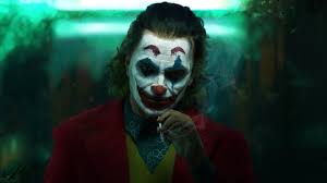 Wallpaper joker as joaquin phoenix and heath ledger in michelangelo painting hd 4k free dc comics, guason, joker, joaquin phoenix, . Joaquin Phoenix Joker With Green And Black Background 4k Hd Joker Wallpapers Hd Wallpapers Id 44117