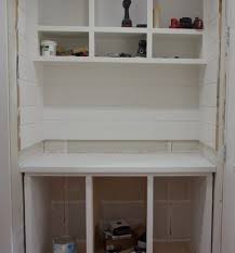 The shelf resembles a shallow drawer that glides out for easy access to items stored in the back of the cabinet. Creating A Built In Hutch Kitchen Entry Makeover Day 3 Sawdust Girl