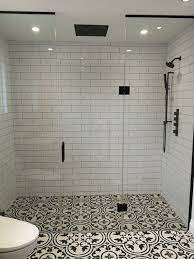 Gemstone black wall and floor tile. Black And White Master Bathroom Bathroom Design Trends Bathroom Trends White Master Bathroom