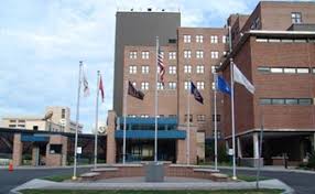 'what's at stake are our basic liberties and basic rights.' voice of america interviews professor emily brown about amazon union drive Syracuse Va Medical Center