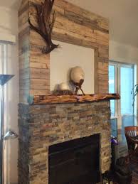 Stacked Stone California Gold From Home Depot Recycled Pallet Wood And A Mesquite Log Mantle Living Room Remodel Stacked Stone Room Remodeling