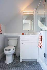 The sloped ceiling in your attic bathroom is the perfect place to house the tub, especially if there's a source of light nearby. Attic Bathroom Sloped Ceiling Design Ideas