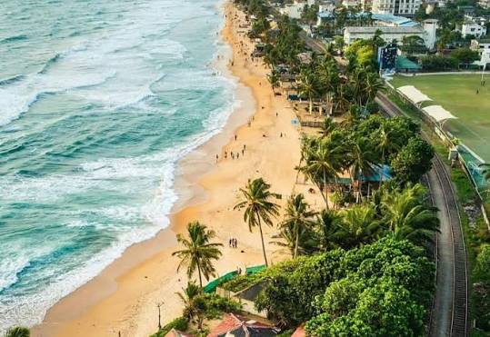 Mount Lavinia Beach golden sand sunset seafood restaurants colonial hotel Colombo south Sri Lanka