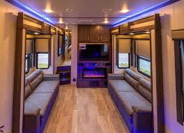 Triple Tow Or Toy Hauler How To Rv Full Time With A Rzr Roads Less Traveled Keystone raptor 427 toy hauler fifth wheel.