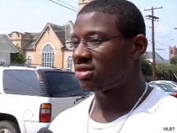 Football star tackles girl with gun