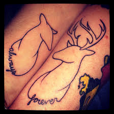Black and grey ink browning deer tattoo on side rib. Buck Doe Couples Tattoos We Both Love The Outdoors And Hunting As Well As Each Other So We Combined It Into The Couple Tattoos Cute Couple Tattoos Tattoos