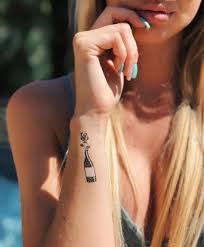 Ideally when placing the tattoo on your face, cut in two pieces and place one by one for better accuracy & easier application. Wine Bottle With Rose Tattooforaweek Fake Tattoos Largest Temporary Tattoo Shop Worldwide Tattooforaweek Product Info Food Drinks Tb K6 L7 R4 K2
