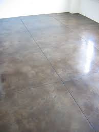 Poured Floor That Mimics Tile I Like The Stain On This One Flooring Concrete Tile Floor Stained Concrete