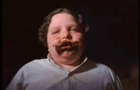 Me eating the chocolate my sisters boyfriend got her for Valentine's Day