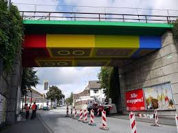 Graffiti Artist Turns A Bridge Into Realistic Lego Street Art Designtaxi Com Lego Bridge Street Artists Wuppertal
