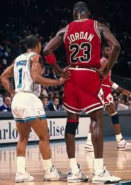 5 3 Muggsy Bogues Stands Alongside 6 6 Michael Jordan During A Hornets Bulls Game On Feb 22 Michael Jordan Basketball Michael Jordan Photos Michael Jordan