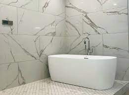 We tiled our bathroom shower with white subway tiles and you can too! Large Format Tile Ideas In Charlotte Nc Queen City Stone Tile