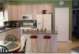 This gives your kitchen a professional appearance, while the antiqued look of pickled cabinets warms things up a bit. Need Wall Paint Help For Pickled Oak Cabinets