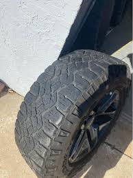 3 rims perfect condition 1 has some light scratches…two tires have 50% life  and two are chopped pretty decent…pics show the wear.