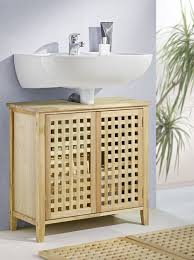 Schoner Waschbecken Unterschrank Mit Zwei Turen Im Attraktiven Lochdesign Aus Massiv Geoltem Walnusshol Waschbeckenunterschrank Unterschrank Waschbeckenschrank