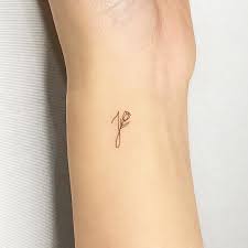 100 Initial Tattoos Perfect For Proclaiming Your Love For Your Partner Matching Couple Tattoos Partner Tattoos Dainty Tattoos