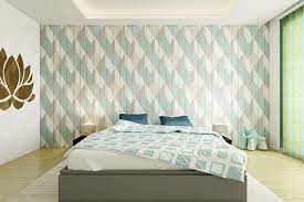 The wallpaper has a floral design and pastel colors. Best Wallpaper Designs For Bedroom Walls Design Cafe