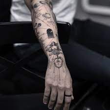 40 Beautifully Unique Tattoo Ideas For You Hand Tattoos For Guys Tattoos For Guys Hand Tattoos