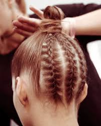 The topknot is many things; 7 Ways To Upgrade Your Topknot Bun Redken