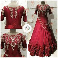 A Bridal Affair Beautiful Maroon Color Long Bridal Gown With Lotus Flower Design On The Boarder Bridal G Long Gown Design Indian Gowns Dresses Gowns Dresses