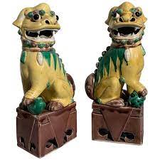 This is the second colorway of the foo dog toy. Pair Of Chinese Yellow Glazed Porcelain Foo Dogs Circa 1930s For Sale At 1stdibs