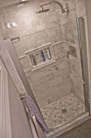 Neutral tones this master bathroom idea features a stunning shower stall that uses neutral, warm tones for a welcoming atmosphere. Shower Tile Bathrooms Remodel Shower Remodel Bathroom Remodel Master