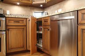 A blind corner is what it's called when part of a cabinet is blocked or hidden by a perpendicular cabinet run, thus making it difficult to reach in and find what you're looking for. Optimizing Blind Corner Cabinets American Wood Reface