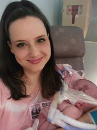 Mother and baby's happy moment after recovery